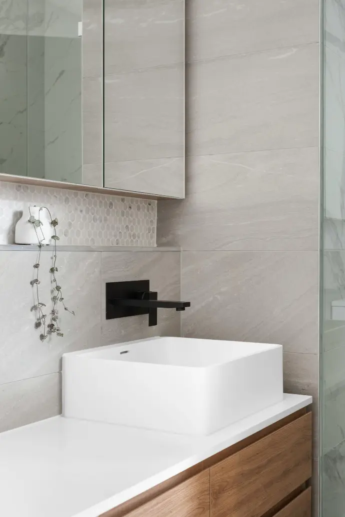 white ceramic sink with faucet