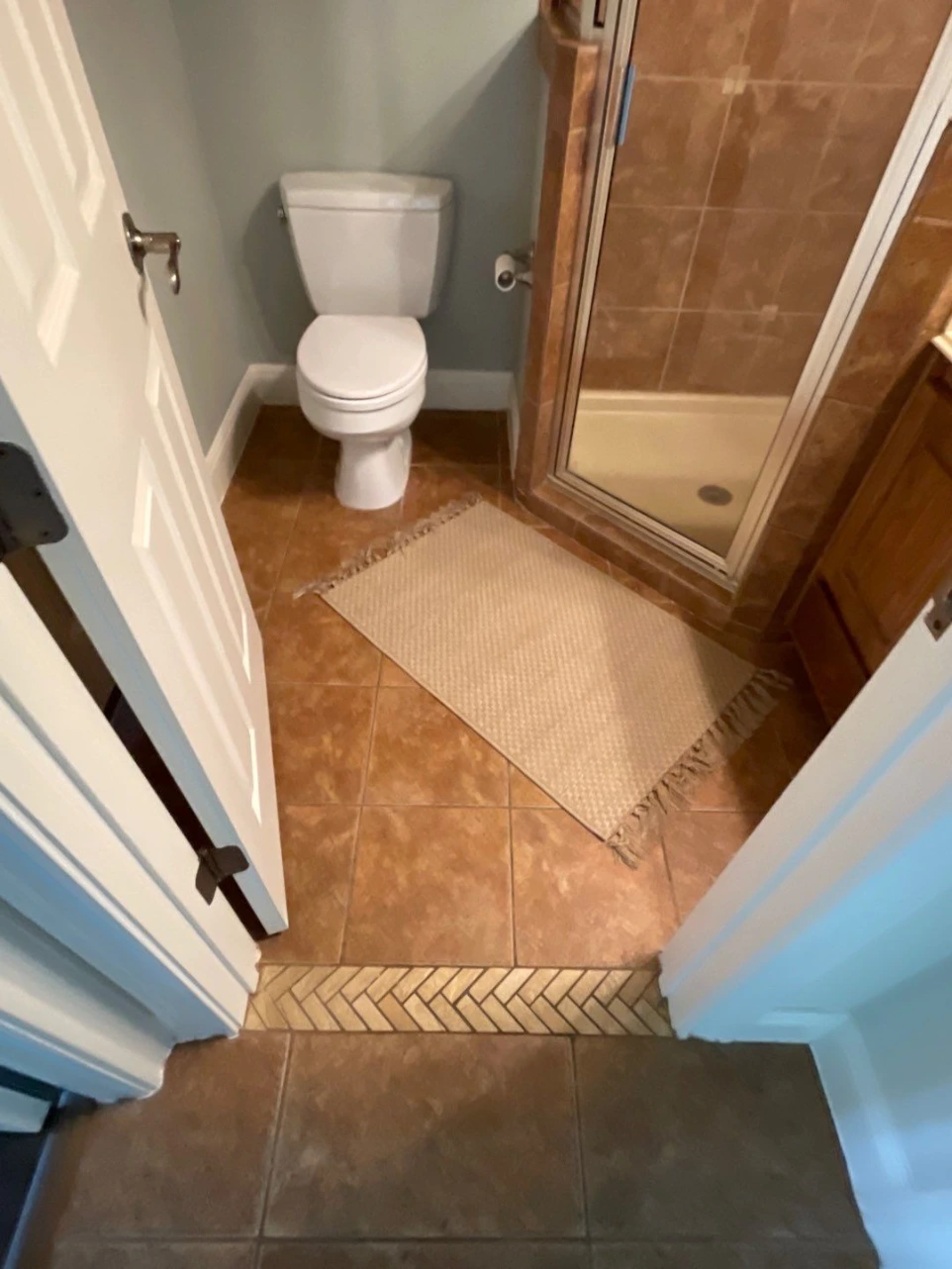 Before photo of bathroom flooring